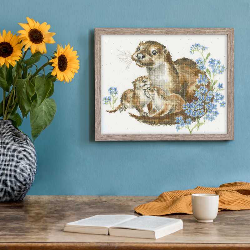 Cozy and stylish composition of creative dining room with mock u Borduurpakket Hannah Dale - Otterly Adorable - Bothy Threads